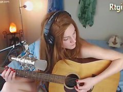 cute skinny tgirl play guitar for her fans