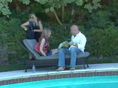Shemale has sex with couple by the pool