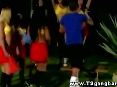 Transsexual cheerleaders practicing their cheering moves