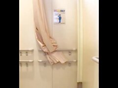 A video of ejaculation by dressing up as a woman in a public toilet and doing anal masturbation.