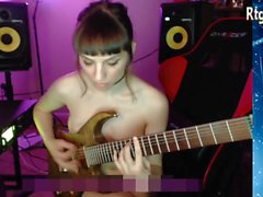 slim trans girl playing the guitar on webcam