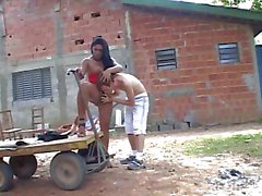 Outdoor fun for a busty tranny and her lover guy